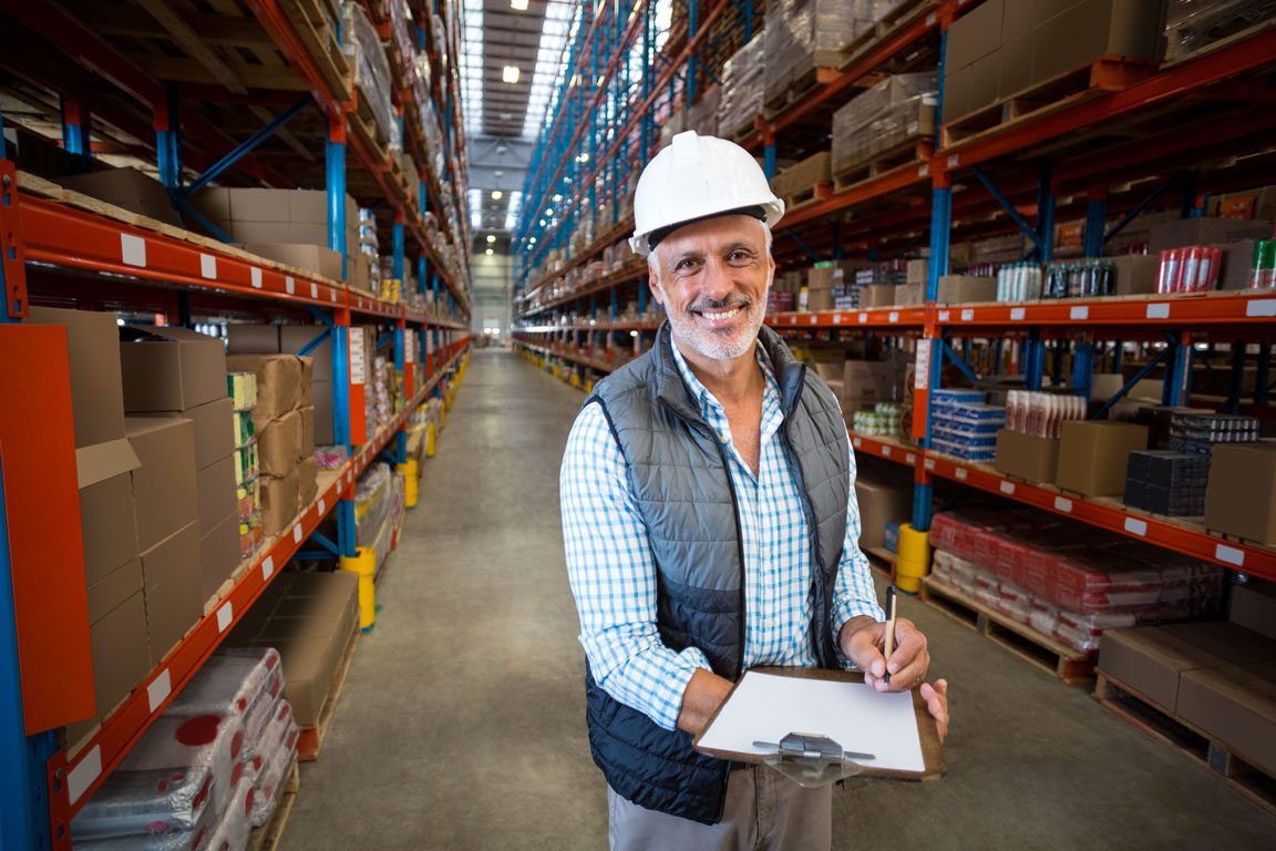 warehouse worker holding clipboard